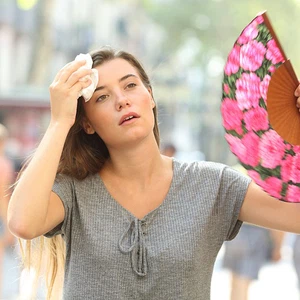 Why do we feel hot with higher humidity?
