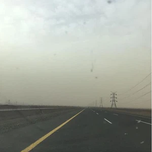 بالصور: عاصفة من الغبار تضرب المناطق الشمالية