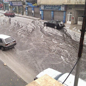 عاصفة بردية تداهم أحياء العاصمة عمّان - شاهد الصور