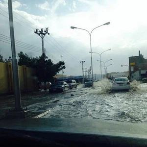 بالصور: الأمطار الغزيرة تضرب حائل وقوس المطر يُزين سمائها 