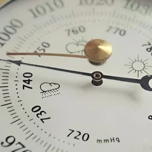 What device measures atmospheric pressure?