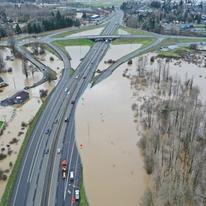 Scenes of homes and main roads submerged in massive floods that swept the US state of Washington