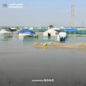 Scenes from Kuwait&#39;s heavy rain and how it flooded parts of the land and turned it into pools of water