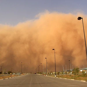 How can air hold that amount of dust and sand?