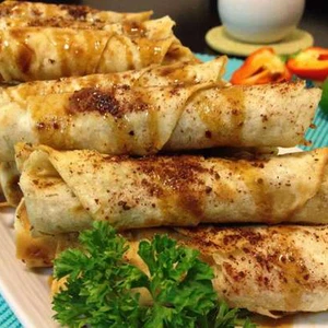 Une recette saine pour préparer des rouleaux de musakhan au poulet