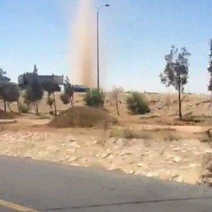 بالصور: زوبعة ضخمة على طريق عمّان - مطار الملكة علياء الدولي