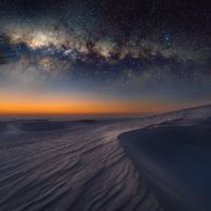 Why does the temperature decrease in hot deserts to become very cold at night? How do living things adapt?