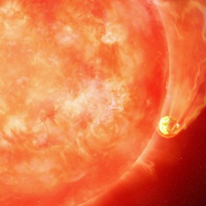 An enlarged star swallows up a neighboring planet, canceling out a sliver of space