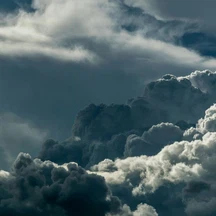 What is the term for the release of heat energy when water vapor condenses to form clouds?