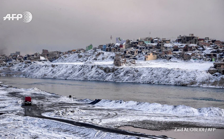 Video and photos See the snow covering large areas of Iraq next to the capital, `Baghdad`