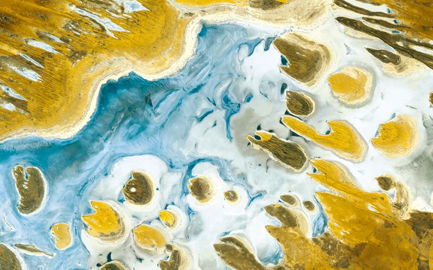 بالصور : فنّان إيطالي يُذهل الملايين برسمات للأرض و كأنه رآها من الفضاء  